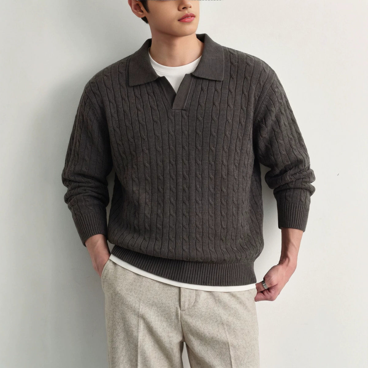 Solid color long sleeved sweater for men