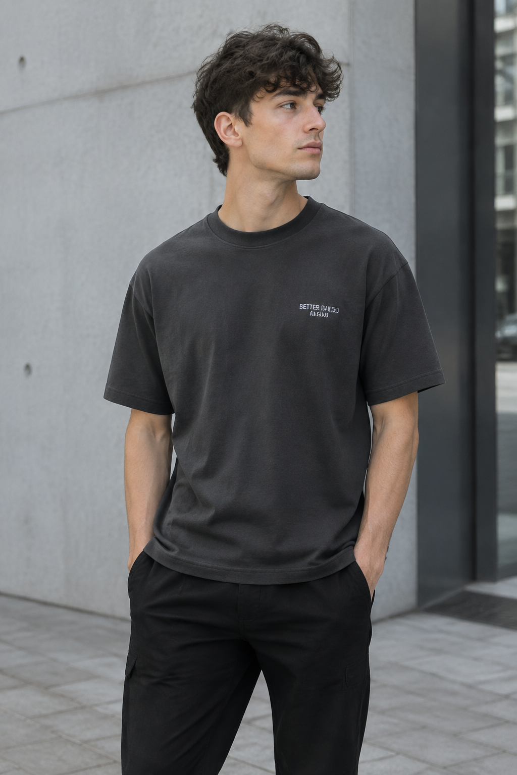 Young man wearing Essential Streetwear Tee in urban setting